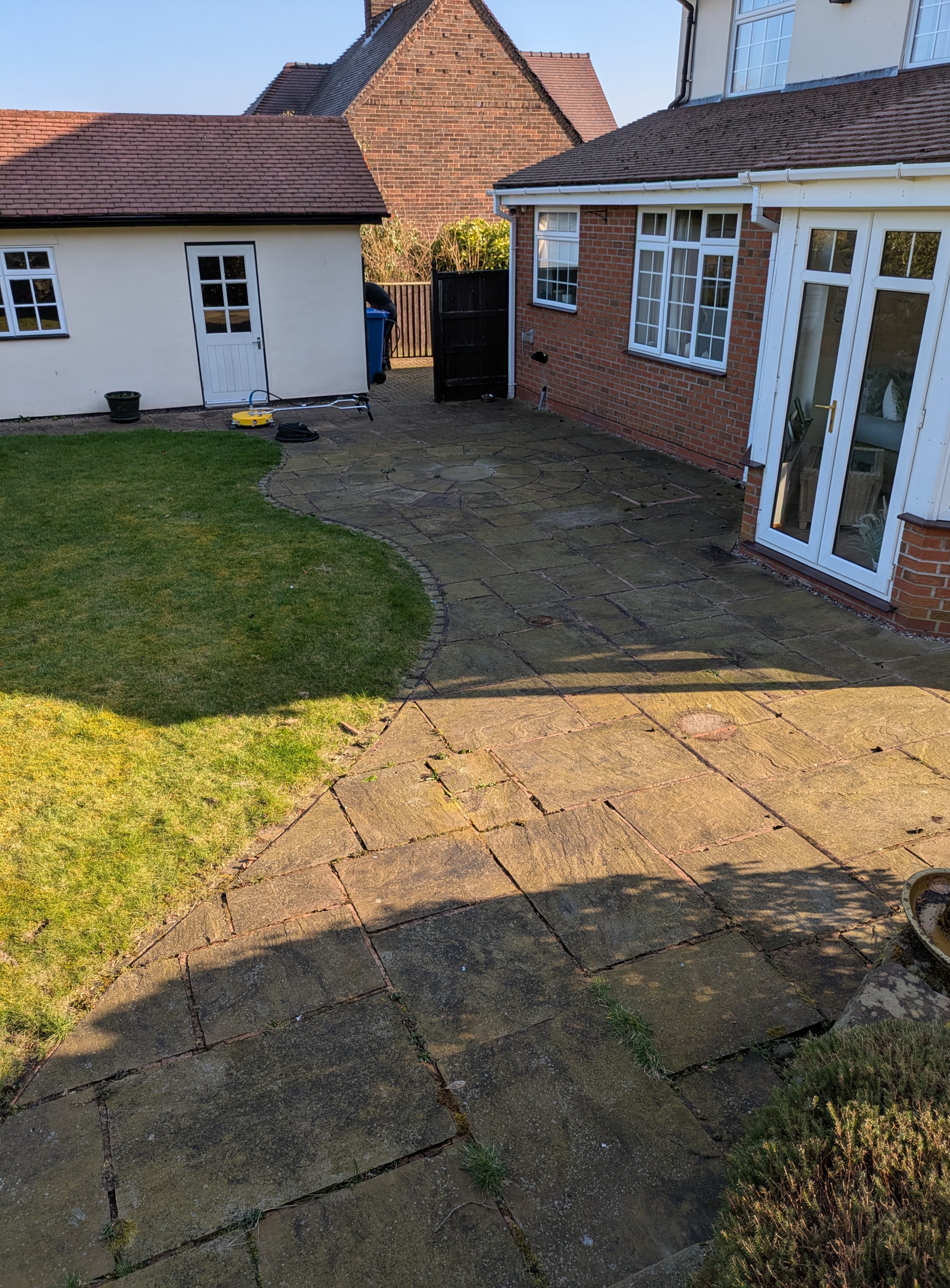 Dirty driveway before power washing